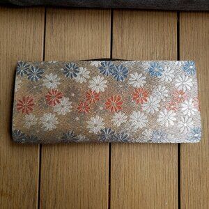 EUC Vintage & Gorgeous Clutch satinesque floral in gold orange white blue tan